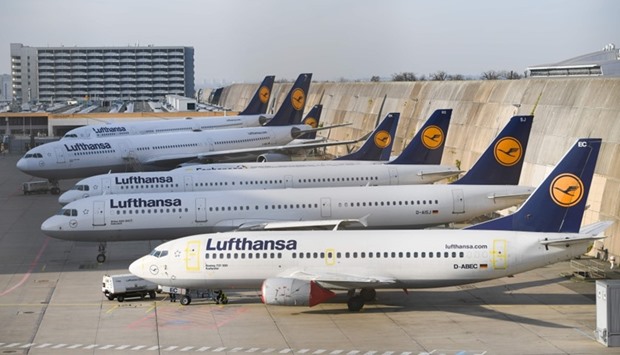 Airplanes of German airline Lufthansa are parked  at the airport in Frankfurt am Main, western Germany
