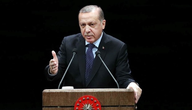 Turkish President Recep Tayyip Erdogan addresses a speech