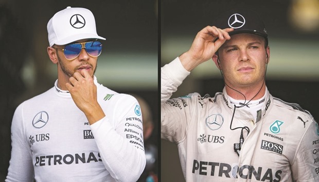 Nico Rosberg (right), just needs to be on the podium tomorrow to be sure of his first world title after being beaten in the last two years by his Mercedes teammate Lewis Hamilton, who has won the last three races going into the season finale in Abu Dhabi. (AFP)