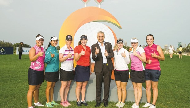 Ladies European Tour CEO Ivan Khodabakhsh (centre) with LET pros at the Qatar Ladies Open.