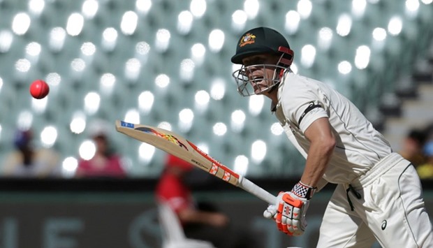 Australian batsman David Warner plays a shot during the fourth day of the Third Test cricket match in Adelaide