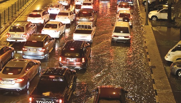 Traffic slowed down due to the downpour. PICTURE: Noushad Thekkayil