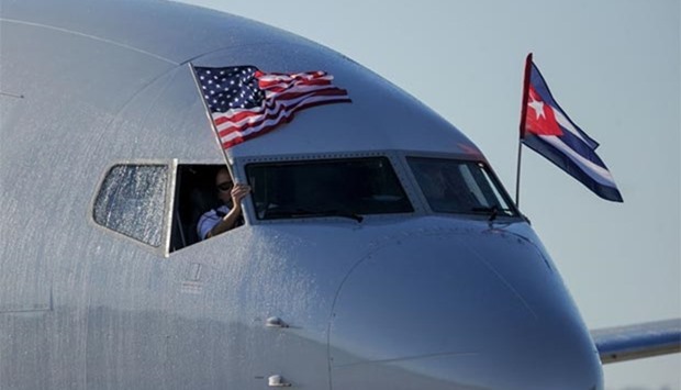 An American Airlines plane with US and Cuban national flags is seen upon arrival at Jose Marti International Airport in Havana on Monday.