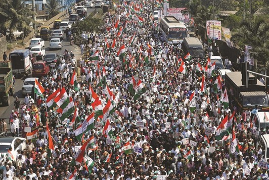 People carry placards and shout slogans during a rally organised by the Congress Party against the governmentu2019s decision to withdraw Rs500 and 1,000 notes from circulation, in Mumbai yesterday.