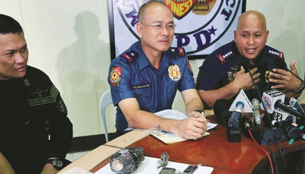 Philippine National Police (PNP) chief Director General Ronald Dela Rosa points at a part of an Improvised Explosive Device (IED) found near the US Embassy during a press conference in Manila yesterday.