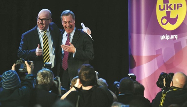 Former Ukip leader, Nigel Farage poses with newly-elected leader of the party, Paul Nuttal, following the leadership announcement in central London yesterday.