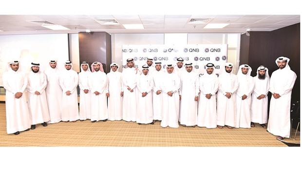 Participants of Qatar Leadership Centreu2019s Government Leaders Programme at QNB Capital recently. Seen among the dignitaries is QNB Group CEO Ali Ahmed al-Kuwari.