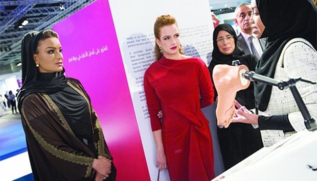 HH Sheikha Moza, Princess Lalla Salma of Morocco and Qatar's Minister of Public Health HE Dr Hanan Mohamed al-Kuwari are briefed about the latest health innovations at the WISH exhibition on Tuesday. PICTURE: AR Al-Baker/HHOPL.