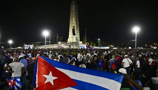 People gather at the Revolution Square to pay homage to late Cuban revolutionary leader Fidel Castro