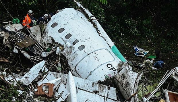 Rescue teams recover bodies of victims of the LAMIA airlines charter that crashed in Colombia on Tuesday.