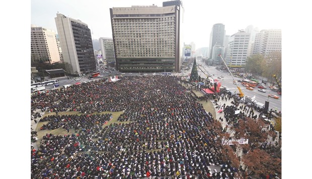 Thousands of protesters gather during an anti-government rally demanding the resignation of South Koreau2019s President Park Geun-Hye in central Seoul.