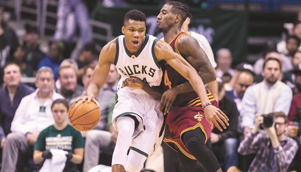 Milwaukee Bucks forward Giannis Antetokounmpo drives for the basket as Cleveland Cavaliers guard Iman Shumpert defends during the second quarter at BMO Harris Bradley Center. PICTURE: USA TODAY Sports