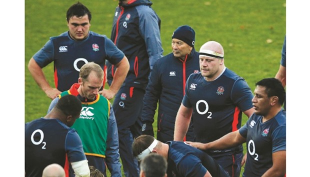 England coach Eddie Jones with Jamie George, Dan Cole and Mako Vunipola during a training session in Bagshot. (Reuters)