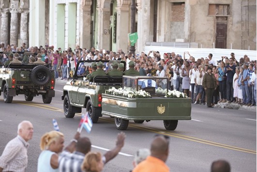 A military vehicle transports the ashes of Cubau2019s late president Fidel Castro at the start of a three-day journey to the eastern city of Santiago, in Havana, Cuba, yesterday.