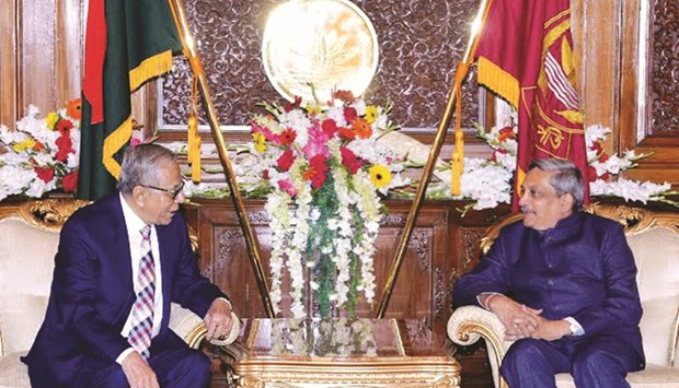 Indian Defence Minister Manohar Parrikar exchanging views with President Abdul Hamid in Dhaka yesterday.
