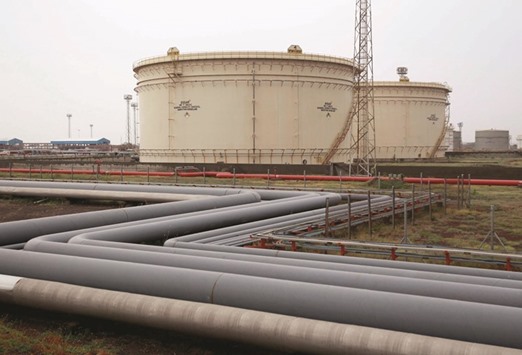 Storage tanks of Essar Oil, which runs Indiau2019s second biggest private sector refinery, in Vadinar, Gujarat. Global oil majors BP and Rosneft are eyeing a piece of Indiau2019s $117bn retail market for fossil fuels, threatening to shake up state-owned companies that have faced little competition for a decade.