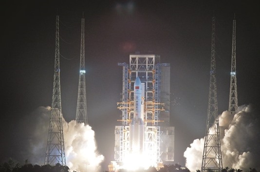 A Long March 5 carrier rocket being launched yesterday from the Wenchang Satellite Launch Center in Hainan Province.