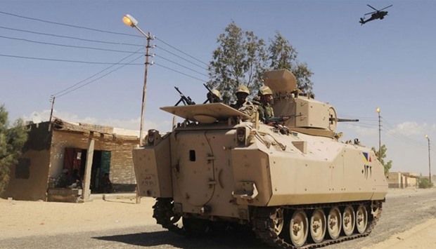 Egyptian army soldiers patrol in northern Sinai.