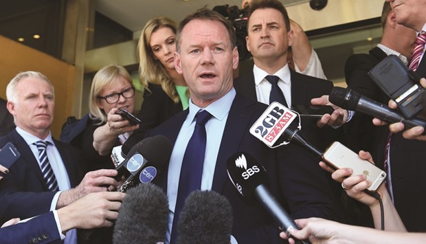 Cricket Australia high-performance chief Pat Howard briefs media outside the court in Sydney yesterday after the coroner ruled that a u201cminuscule misjudgementu201d led to by Australian batsman Phillip Hughes' death, and that neither the bowler (Sean Abbott) nor anyone else was to blame for the tragedy. Hughes died in November 2014 after being hit on the neck by a rising ball. (AFP)