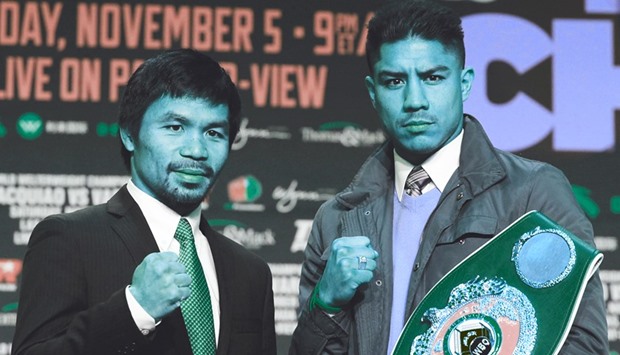 Boxers Manny Pacquiao (L) of the Philippines and Jessie Vargas of the US pose during their final news conference at The Wynn Las Vegas on November 2. Pacquiao will challenge Vargas for the WBO Welterweight Championship title today at the Thomas & Mack Center in Las Vegas.