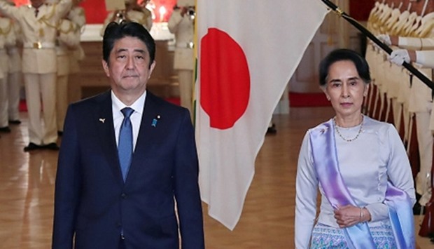 Myanmar State Counselor Aung San Suu Kyi with Japan's Prime Minister Shinzo Abe