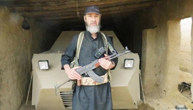 Pictures posted by Islamic State sympathisers on Twitter showing a man resembling Kelly posing with a machine gun