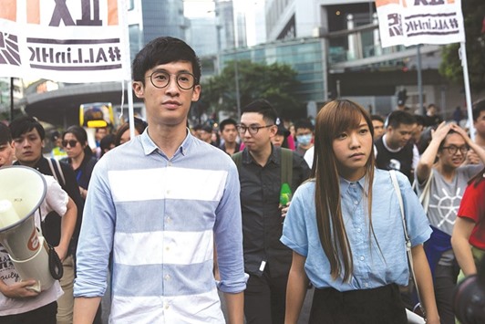 Baggio Leung (left) and Yau Wai-ching of the Youngspirations organisation march during a protest in Hong Kong yesterday morning.