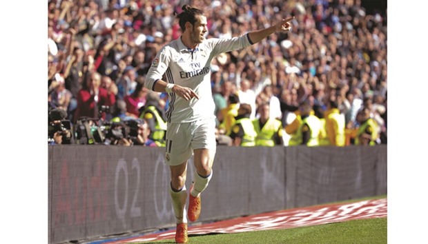 Real Madridu2019s Gareth Bale celebrates after scoring a goal during his teamu2019s La Liga match against Leganes yesterday.