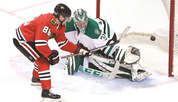 Chicago Blackhawks right wing Patrick Kane scores past Dallas Stars goalie Kari Lehtonen during the second period at the United Center in Chicago, Ill. PICTURE: Chicago Tribune/TNS