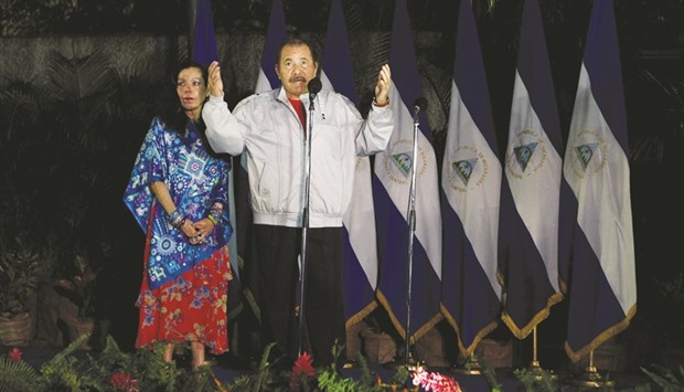Daniel Ortega, Nicaraguau2019s current president and presidential candidate from the ruling Sandinista National Liberation Front, speaks to the media beside his wife Rosario Murillo in Managua.