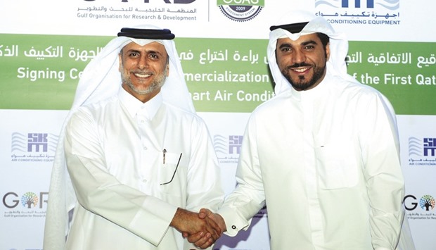 GORD founding chairman Yousef Alhorr (left) and SKM executive director Abdul Karim al-Saleh after signing the agreement for the commercialisation of GORDu2019s smart AC cooling system. PICTURE: Shemeer Rasheed