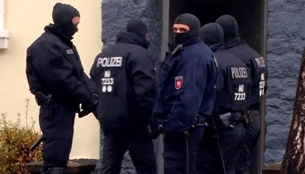 German special police forces raiding a house