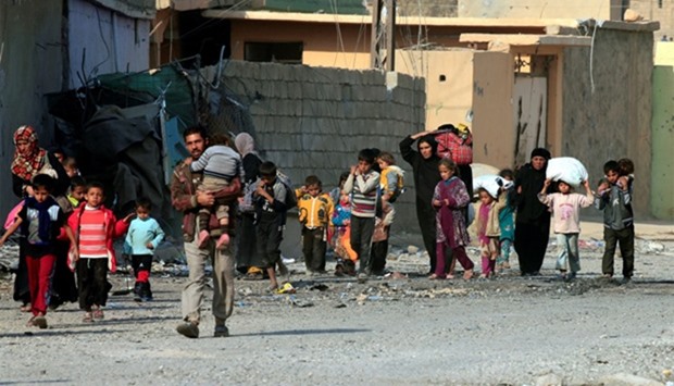 Displaced people who fled the violence of Islamic State militants in Mosul