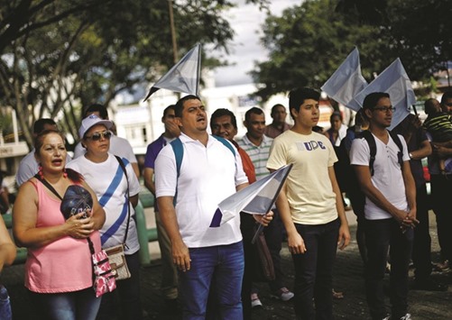 Nicaraguans living in Costa Rica demonstrate against what they call an electoral farce in Nicaragua.