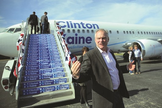Democratic US vice presidential candidate senator Tim Kaine (D-VA) arrives to board his campaign plane on the way to New York at the Richmond international airport in Richmond, Virginia, yesterday.