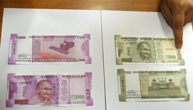 New 500 and 2000 INR notes are displayed at the Reserve Bank of India (RBI)