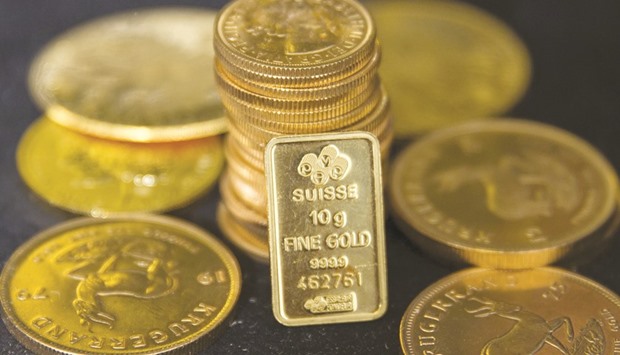 Gold pulled back from its biggest jump since Britainu2019s Brexit vote as turmoil across financial markets eased following Donald Trumpu2019s surprise US presidential election victory