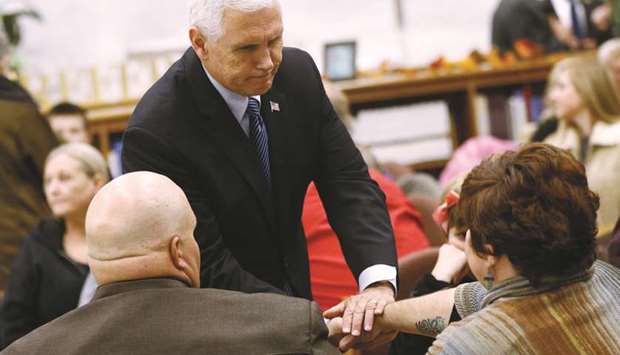 Pence is seen during a visit with family and victims of the shooting at First Baptist Church in Sutherland Springs.