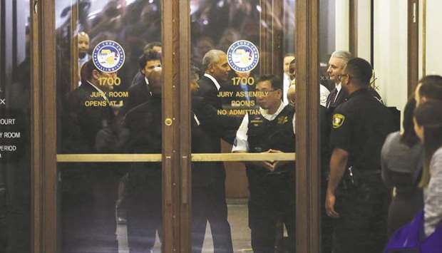 Obama arrives for Cook County jury duty at the Daley Centre in Chicago, Illinois.