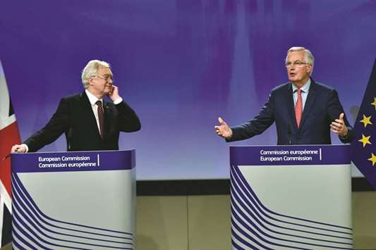 Secretary of State for Exiting the European Union David Davis and European Unionu2019s chief Brexit negotiator Michel Barnier address a joint news conference after the latest round of talks in Brussels, Belgium, yesterday.