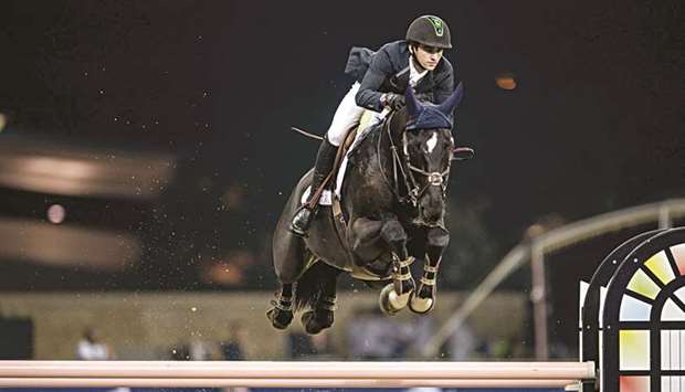 Marlon Modolo Zanotelli jumps clear with his horse Extra van Essene en route to victory in the Global Champions Tour at Al Shaqab arena yesterday. PICTURE: Mohamed Tinakicht