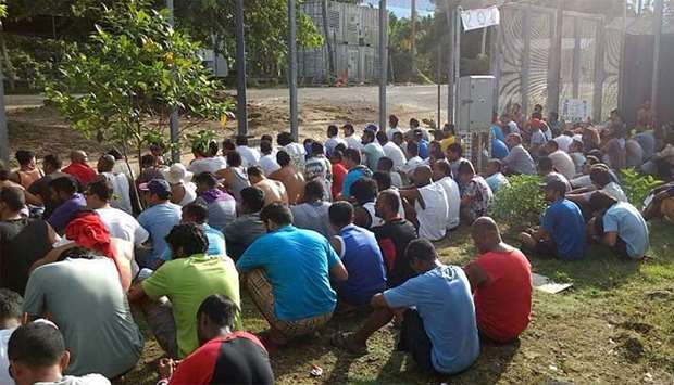 Detainees staging a silent protest inside the compound at the Manus Island detention centre in Papua New Guinea
