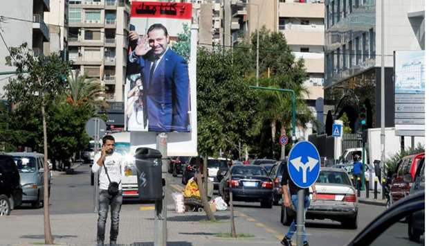 A poster depicting Lebanon's Prime Minister Saad al-Hariri, who has resigned from his post, is seen in Beirut. Reuters