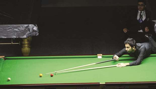 Pankaj Advani of India in action against compatriot Rupesh Shah during their semi-final of the IBSF World Billiards 150-Up Championship yesterday. PICTURES: Shaji