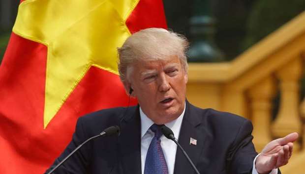 US President Donald Trump speaks during a news conference at the Presidential Palace in Hanoi