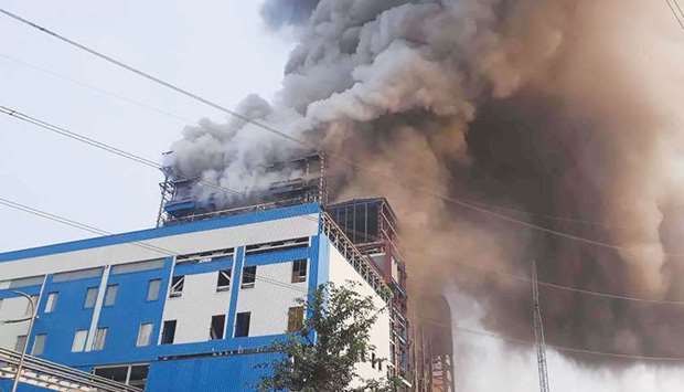 Smoke billows from a coal-fired power plant after a boiler unit exploded in the town of Unchahar in the Uttar Pradesh yesterday.