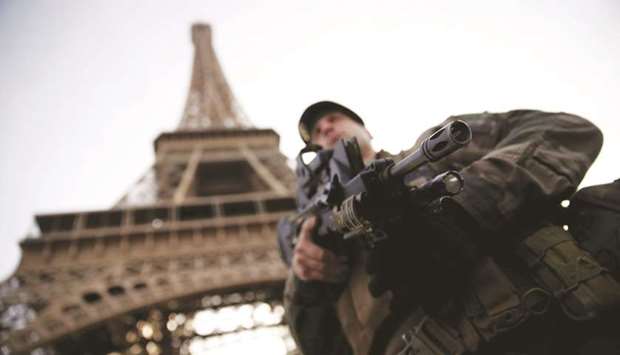 This picture taken on November 1 shows a French soldier at the Eiffel Tower.