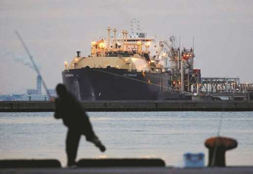 A liquefied natural gas (LNG) tanker is moored at a power station in Futtsu, east of Tokyo (file). Natural gas demand growth is set to outpace both oil and coal over the coming years, leading producers to pitch the fuel as a bridge between a fossil-fuel past and a carbon-free future.