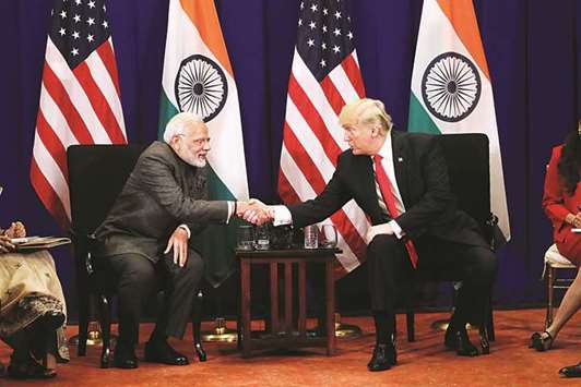US President Donald Trump shakes hands with s Prime Minister Narendra Modi during a bilateral meeting alongside the Aean Summit in Manila yesterday.