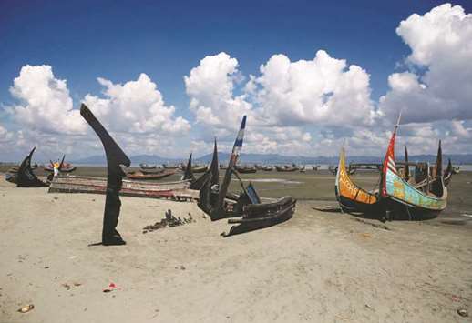 A burned boat used by the Rohingya refugees to cross Bangladesh-Myanmar border is pictured at Shah Porir Dwip near Coxu2019s Bazar, Bangladesh.